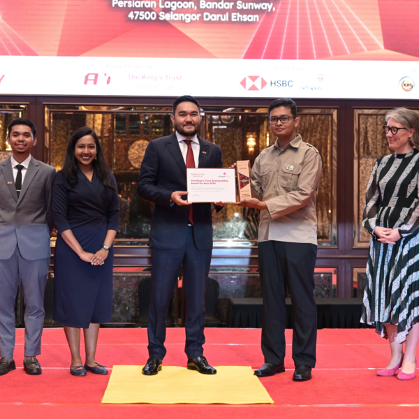 Amirul receiving award