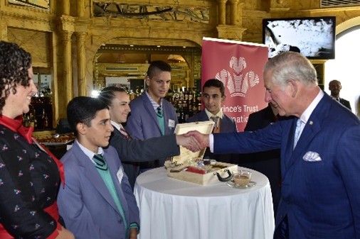 Andre representing his school in front of HM King Charles III in Malta in 2015