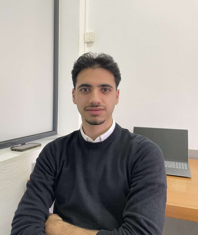 Georgios on his desk